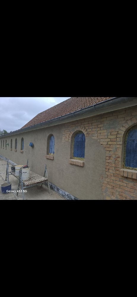 Sandblæsning af hus efterfulgt af filsning